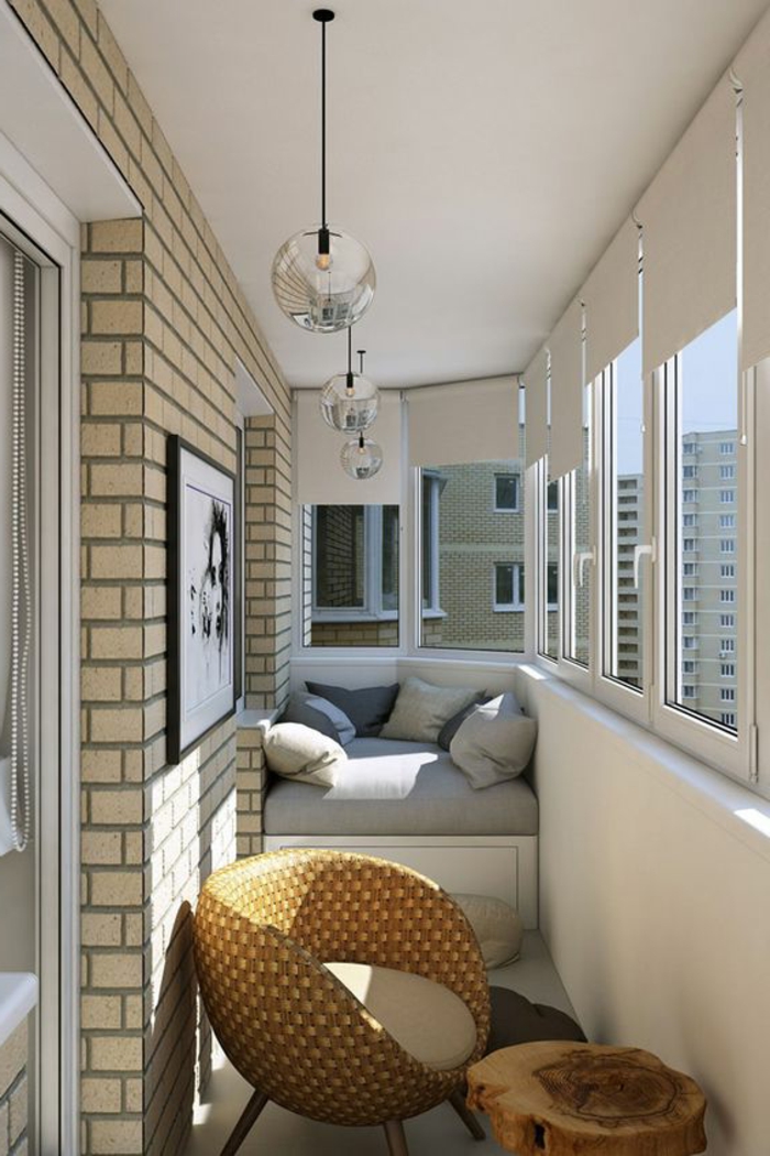 como-decorar-una-habitación-terraza-sofá-pequeño-silla-de-ratan