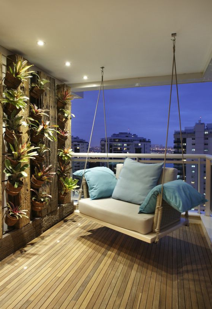 ideas-para-decorar-la-terraza-oscilación-cojines-plantas-de-pared