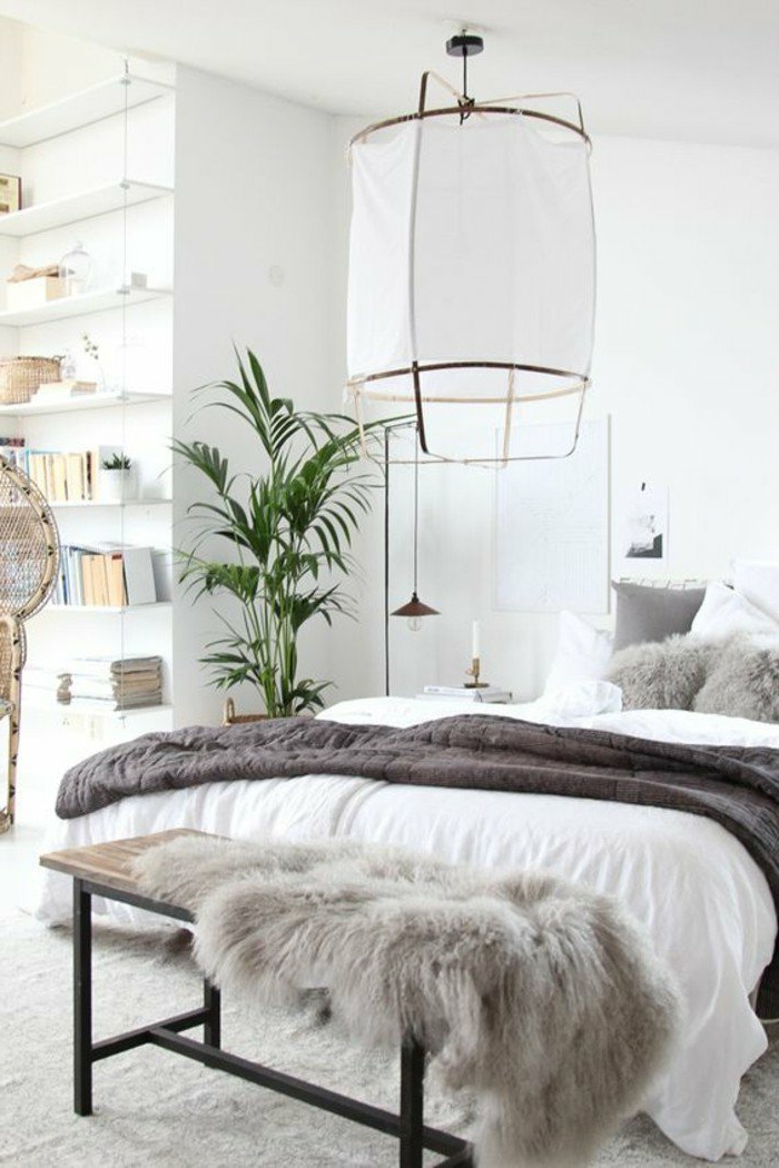 decoracion-de-dormitorios-doble-cama-manta-gris-lámpara-grande-paredes-blancos