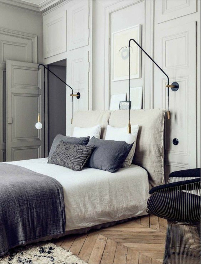 decoracion-de-dormitorios-tonos-grises-cojines-decorativos-lamparas-interesantes-sillón
