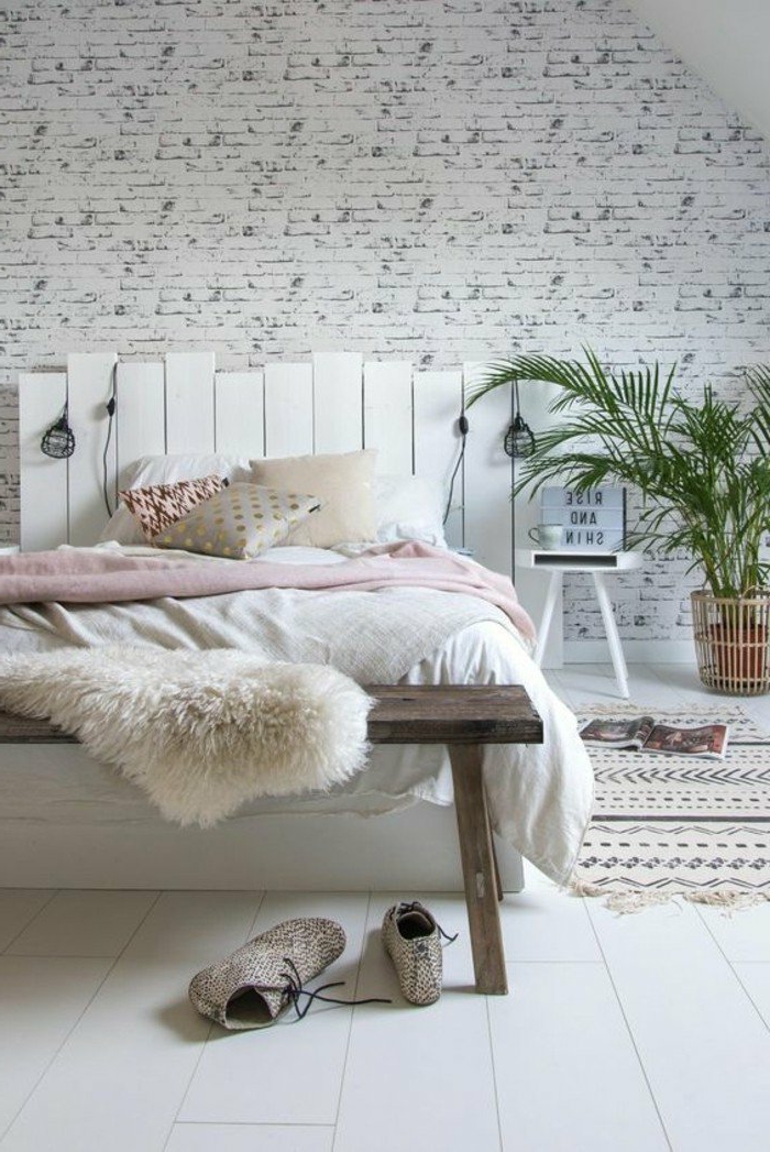 dormitorios-modernos-colores-naturales-manta-color-rosa-plantas-de-decoracion