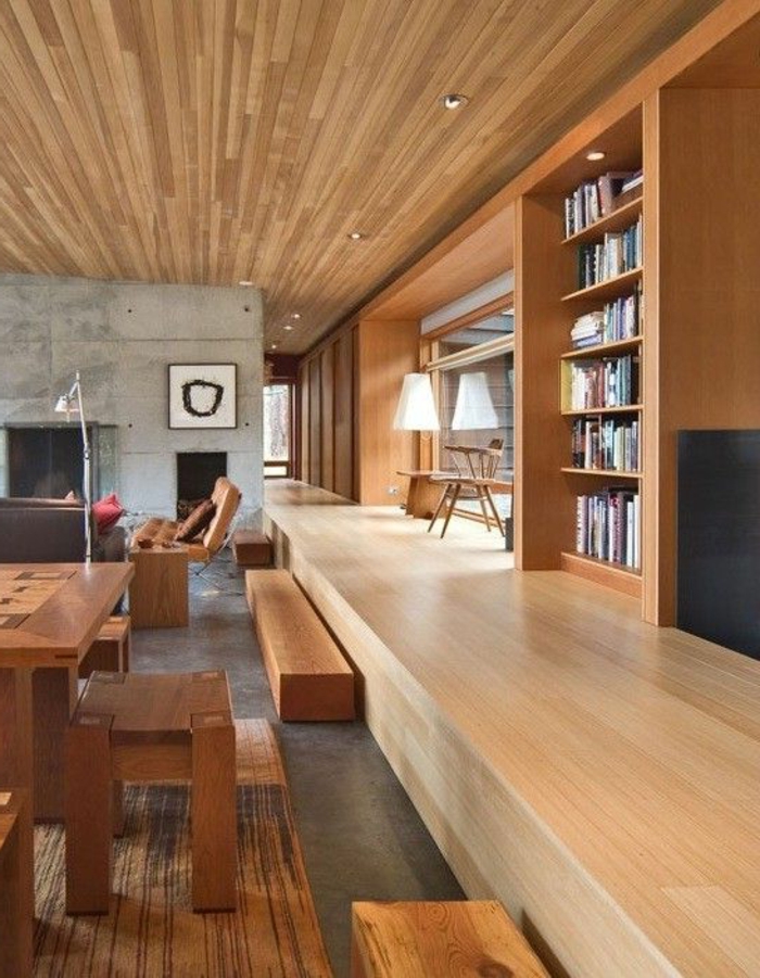 fachadas-modernas-muebles-de-madera-librería-ventanas-grandes-tonos-naturales