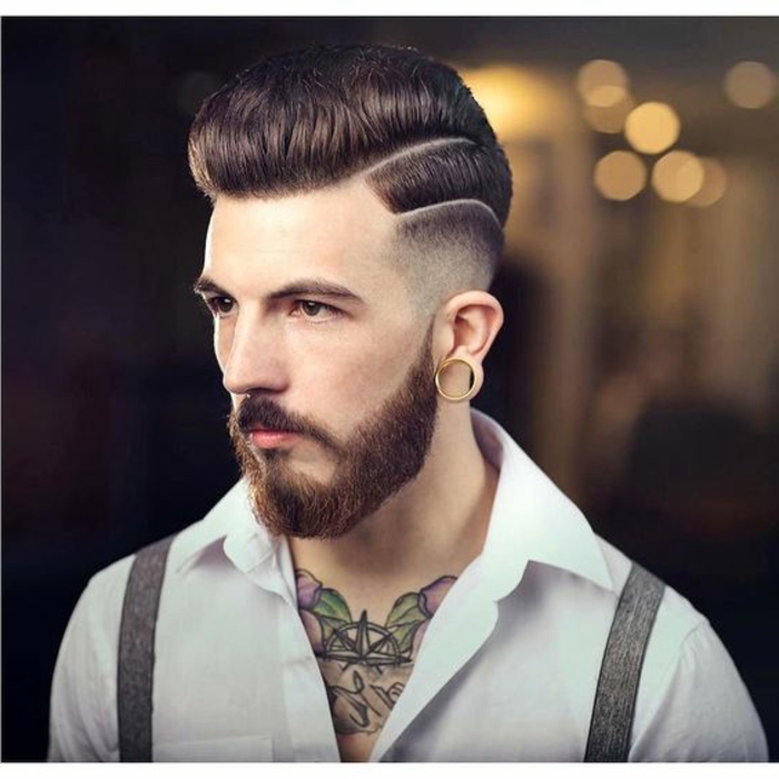 barbas-de-moda-estilo-moderno-bien-cortada-hombre-extravagante-pelo-castaño-tatuajes