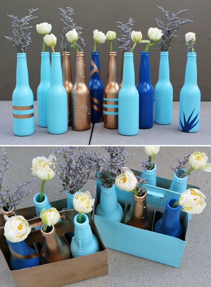 manualidades de papel, botellas pintadas en dorado y azul para floreros