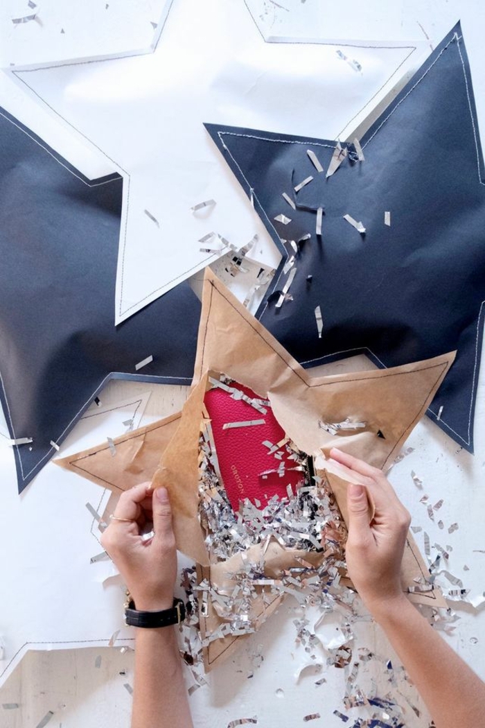 estrellas de papel, empaquetado original para Navidad, manualidades faciles en forma de estrella, estrellas de papel con regalos dentro