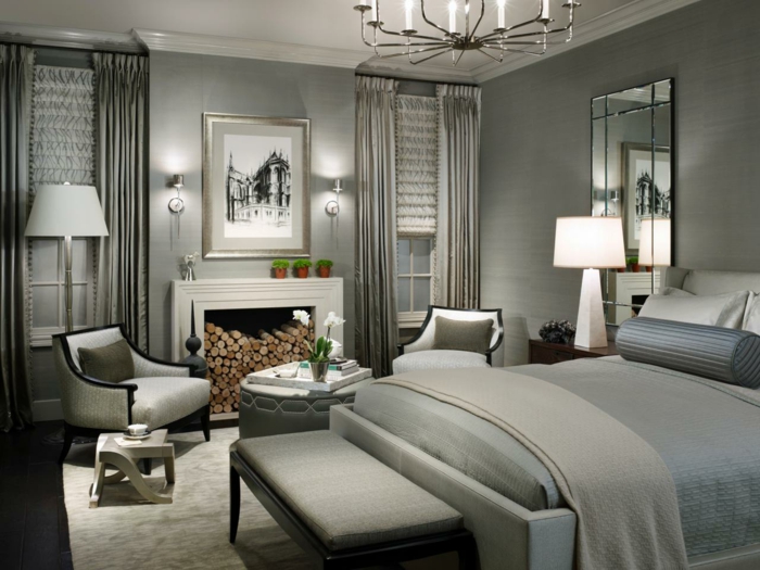 dormitorios modernos, ambiente en gris, muebles con toque vintage, candelabro clásico y pie de cama de madera