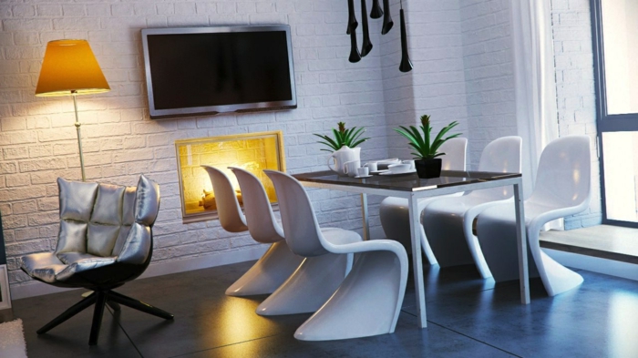 salon comedor, variante muy moderna, paredes con ladrillos blancos artificiales, sillas en blanco modernas, mesa rectangular, lámparas decorativas