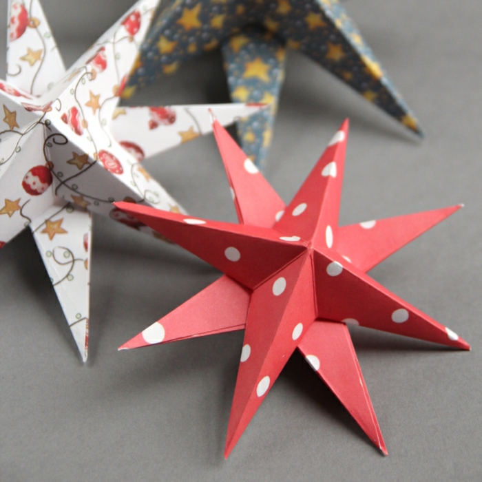 tipos de estrellas, como hacer estrellas de ocho puntos de cartón en tres dimensiones, adornos en diferentes estampados navideños