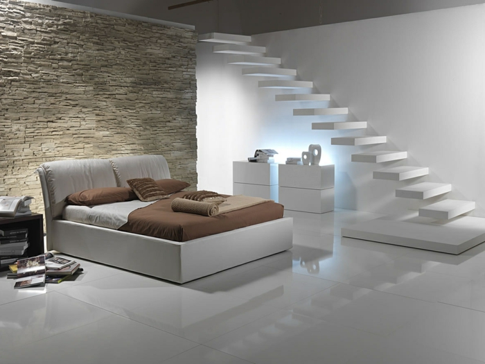 panel piedra, dormitorio en blanco con escaleras, decoración moderna, cama doble, estilo minimalista, pared de piedra decorativa