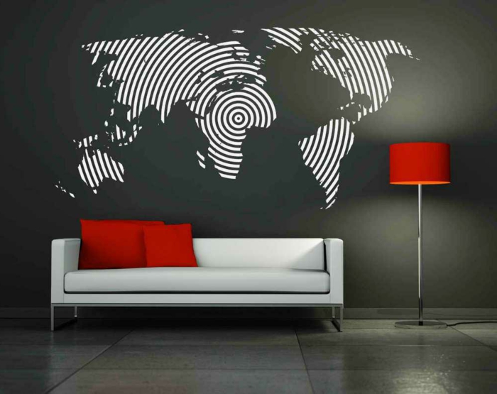 vinilos baratos, salón modeno en gris y rojo, pared oscura, vinilo blanco mapa mundo de círculos