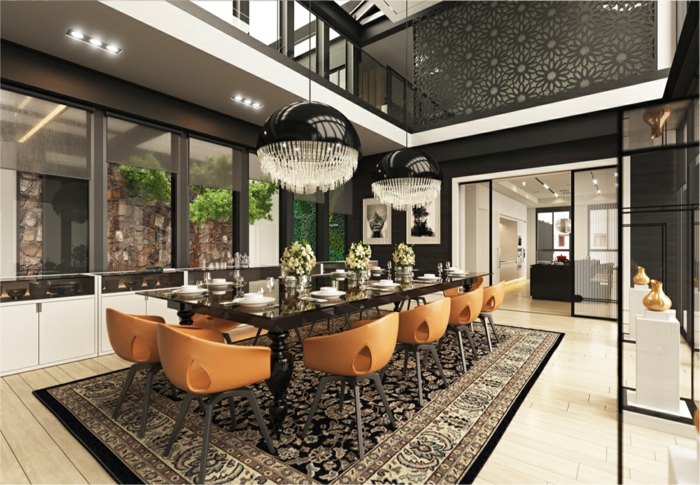 muebles de salon modernos, piso duplex xon comedor grande, mesa de mármol con sillas color ocre y lámparas modernas
