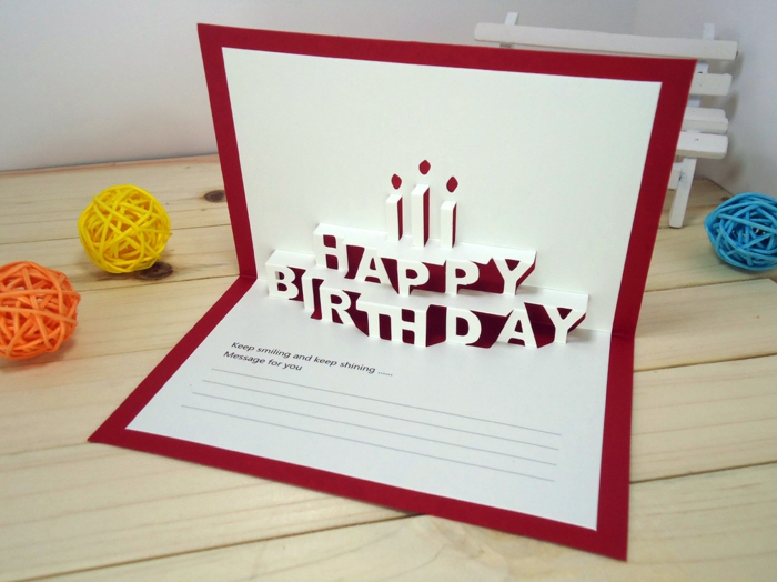 felicitaciones cumpleaños, tarjeta de cumpleaños troquelada en blanco y rojo, candelas y happy birthday