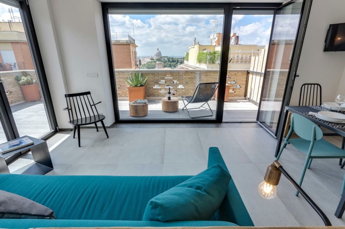 precioso ejemplo de diseño de terraza, terrazas con encanto decoradas en estilo moderno, salón en estilo contemporáneo, sofá en color aguamarina