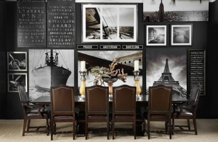decorar con fotos, comedor moderno con muebles vintage en marrón y pared pintada en negro con grandes fotos decorativas en blanco y negro