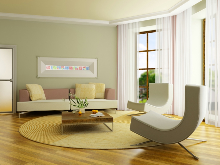 combinacion de colores, salón estilo moderno, mesa de madera baja, alfombra redonda de mimbre, ventanas grandes, paredes en verde seco, techo amarillo pálido