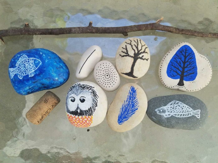 piedras para jardin, piedras pintadas sobre vidrio, peces, arboles y buho, pintura acrilica, manualidades faciles