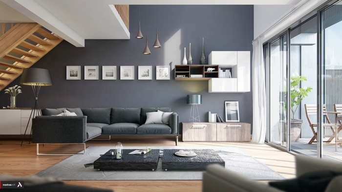 estilo contemporaneo, salon moderno, casa con escaleras de madera, pared en gris azulado, cuadros en blanco y negro, mesa a ras del suelo
