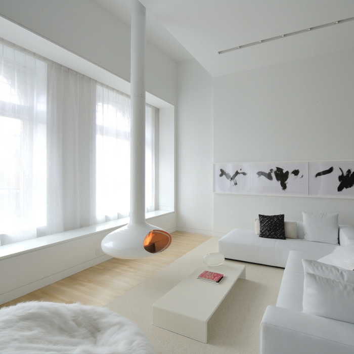 preciosa decoración en estilo nórdico con chimenea de leña en blanco, salones minimalistas en blanco 