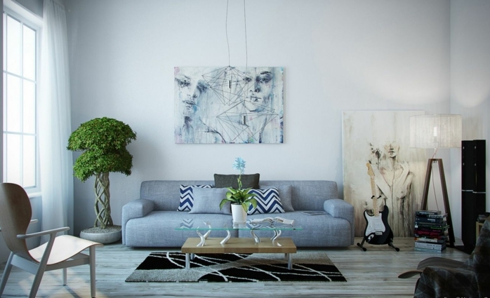 decoración en azul grisáceo, salón moderno. bonsai grande, sofá con cojines. mesa de madera y vidrio, colores para habitaciones, pinturas al oleo grandes