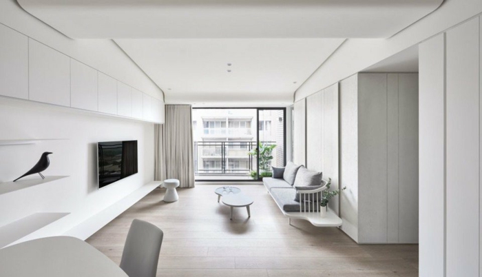 grande salón en blanco con bonita decoración, muebles de salon modernos de diseño sencillo y líneas limpias