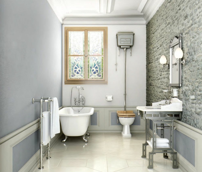 decoracion baños modernos con toque rústico, bañera patas garra, pared de piedra y suelo de baldosas 