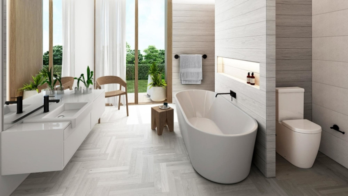 cuartos de baño pequeños decorados en blanco y beige en estilo minimalista, bañera moderna exenta