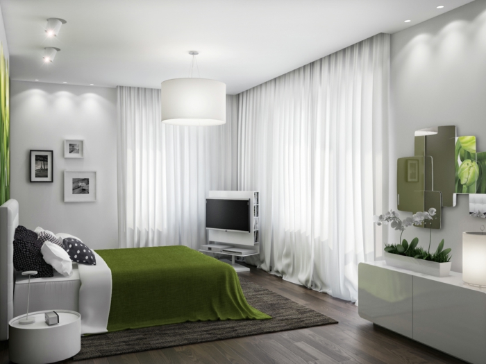 feng shui dormitorio con cama blanca con cabecera alta y manta verde, paredes y cortinas blancas 