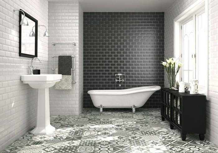azulejos baños porcelanosa, suelo de baldosas de figuras geométricas y motivos étnicos, paredes blancas y negra