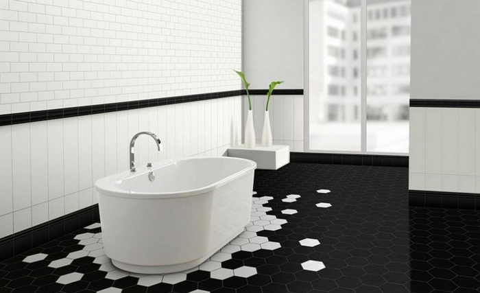 azulejos baños porcelanosa, baldosas hexagonales de color blanco y negro, con bañera de color blanco 