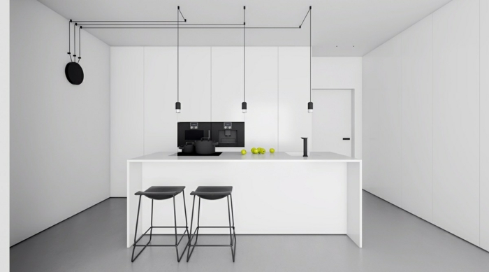 cocina blanca y gris decorada en etilo minimalista, suelo en gris y muebles en blanco, decoración en estilo contemporánea 