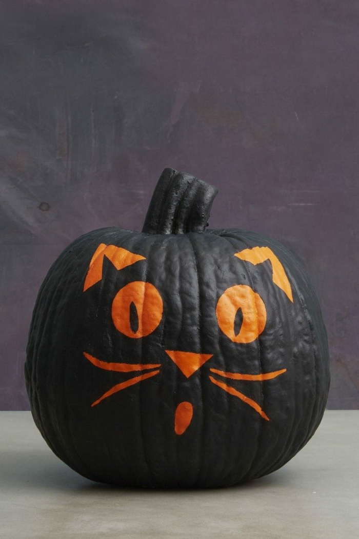 simpáticas propuestas sobre como decorar calabazas de halloween, como personalizar una calabaza gato 