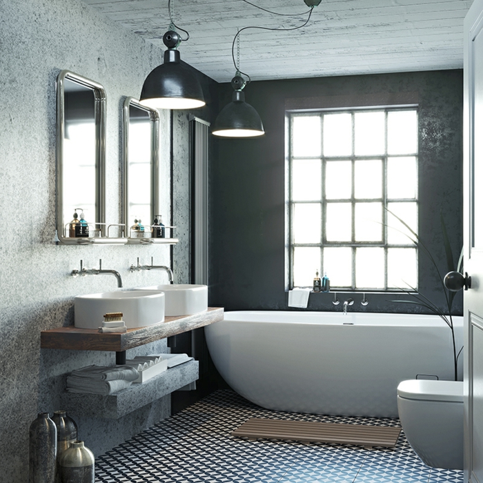 baño en gris decorado en estilo industrial, paredes en gris, suelo con azulejos mozaícos, bañera oval 