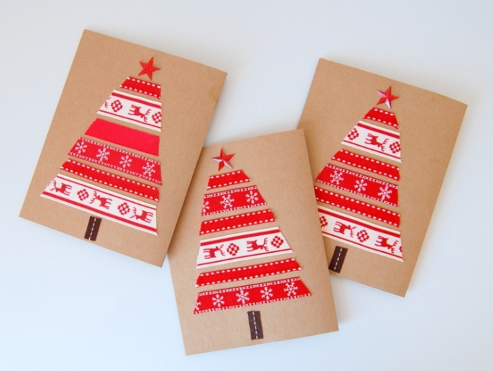 postales de navidad hechas a mano decoradas con cintas adhesivas con motivos navideños 