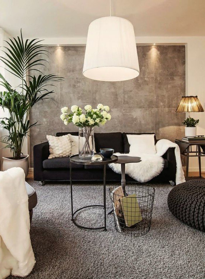 habitación gris y blanca con muchas flores y plantas verdes, luces empotradas, decoración salón moderno 