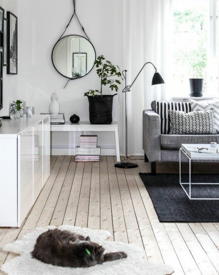 espacio decorado en blanco y gris según el estilo escandinavo, salon gris y blanco, suelo de parquet