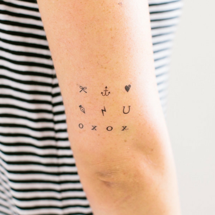 pequeños detalles tatuados en el brazo, diseños de tattoos temporales para hombres y mujeres