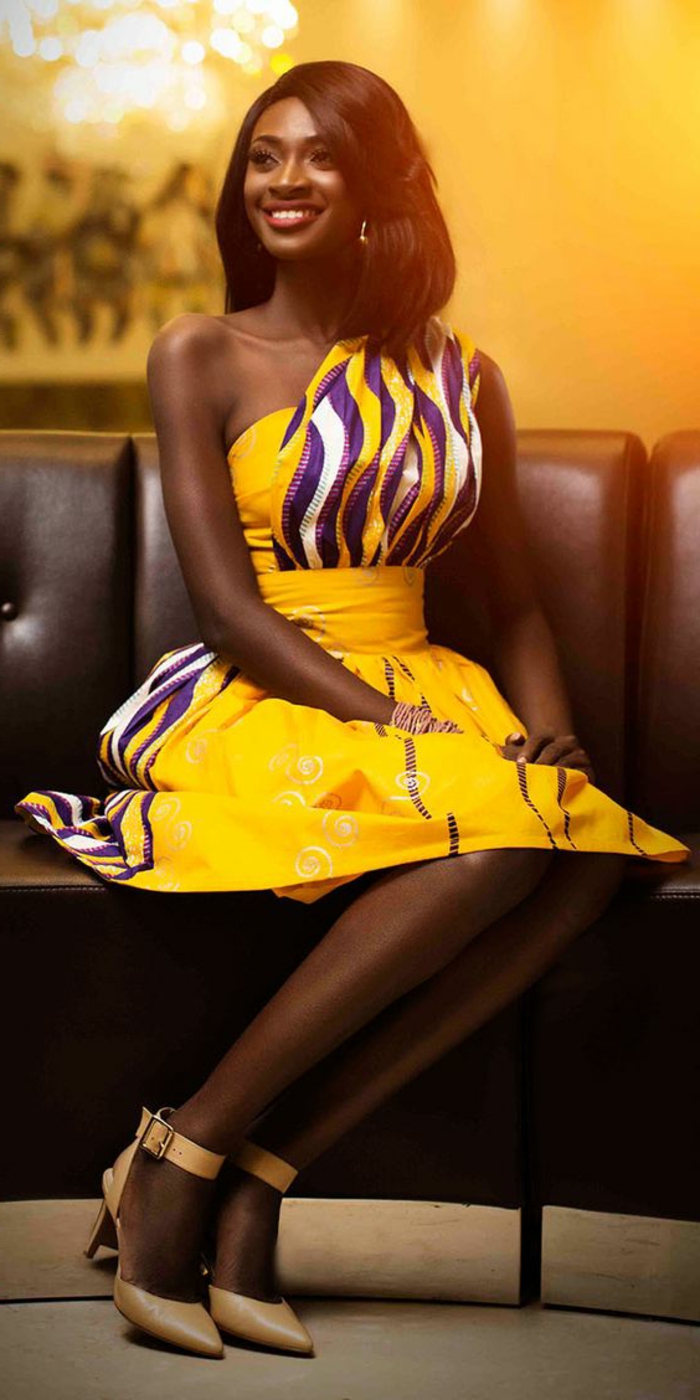 los vestidos más bonitos inspirados en la moda africana, vestido amarillo asimétrico sin mangas 