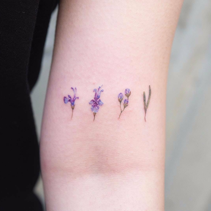 tatuaje acuarela en el brazo, tatuajes minimalistas con flores, los mejores diseños de tattoos