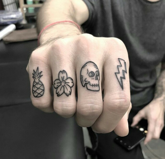 bonitos diseños de tatuajes en los nudillos, tatuajes en los dedos pequeños y simbólicos 