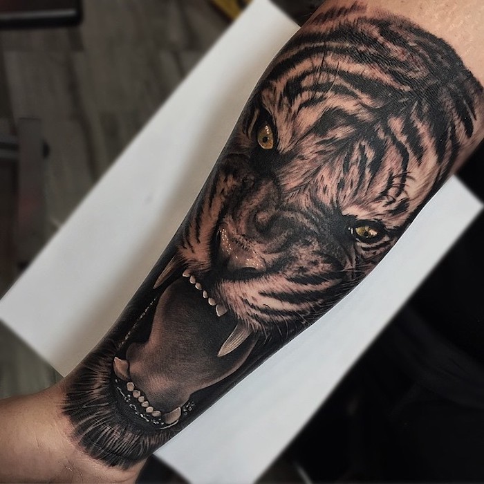 tatuaje antebrazo en estilo realista, tatuajes de animales con significado, diseños de tatuajes realistas, bonitas ideas de tattoos