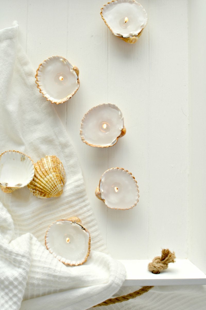 mini velas hechas de conchas, ideas sobre como hacer manualidades para decorar la casa en verano, velas caseras originales 
