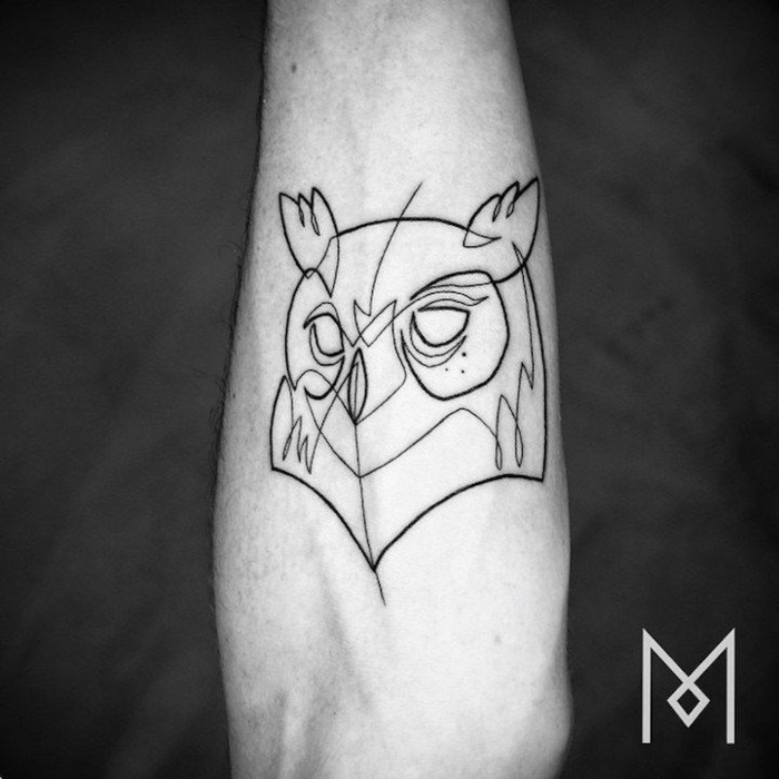 fotos de animales geometricos y lineales tatuados en el brazo y el antebrazo, diseños de tattoos con una sola linea 