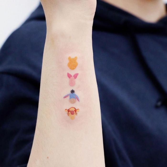 tatuajes diseny pequeños, diseños de tattoos pequeños en el antebrazo, los mejores diseños de tatuajes en colores, pequeños tatuajes inspirados en Disney