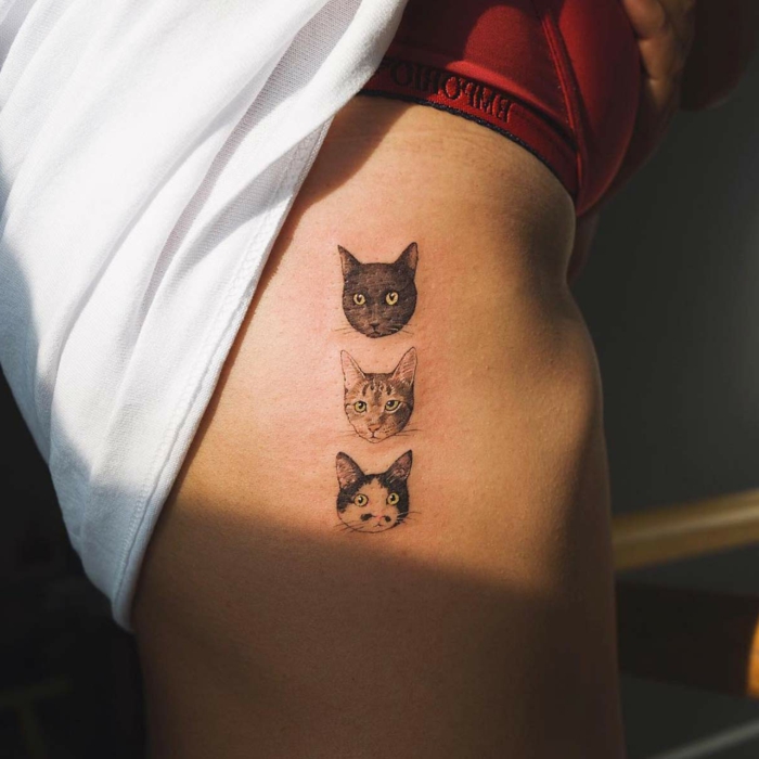 preciosos tatuajes de gatos en las costillas, tatuajes realistas originales para hombres y mujeres, diseños de tattoos en imágenes 