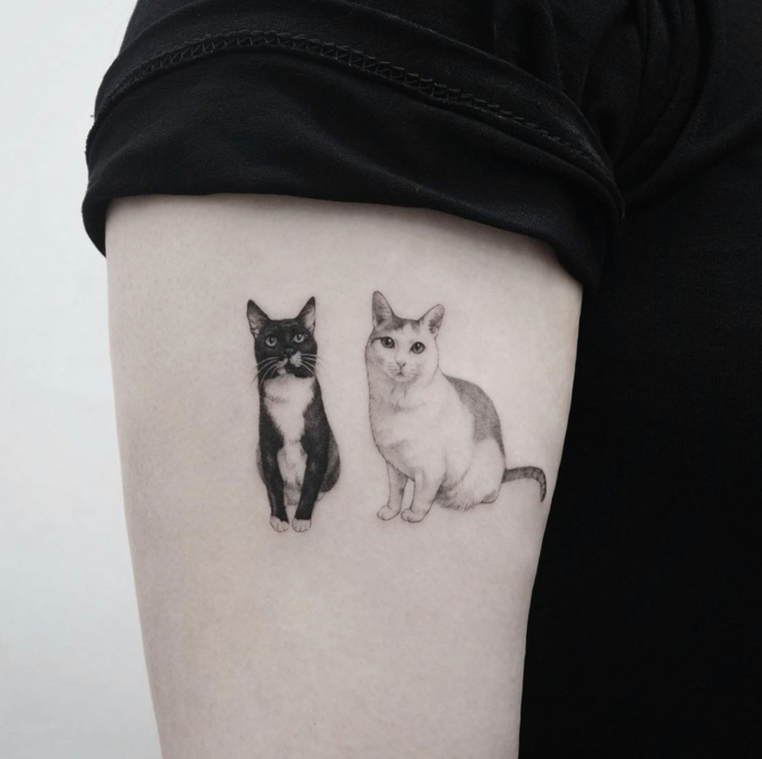 ideas de tatuajes originales con animales, tatuajes en el brazo en estilo realista, fotos de bonitos tattoos con mascotas 