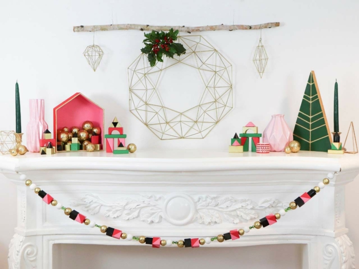 ideas de manualidades para navidad originales, guirnalda navideña de madera con detalles de madera geométricos